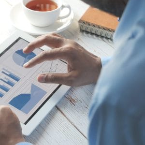 Digital marketer analysing lead generation campaign results